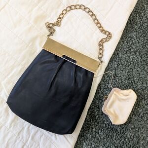 1940s black satin evening purse with metal clasp and attached coin wallet